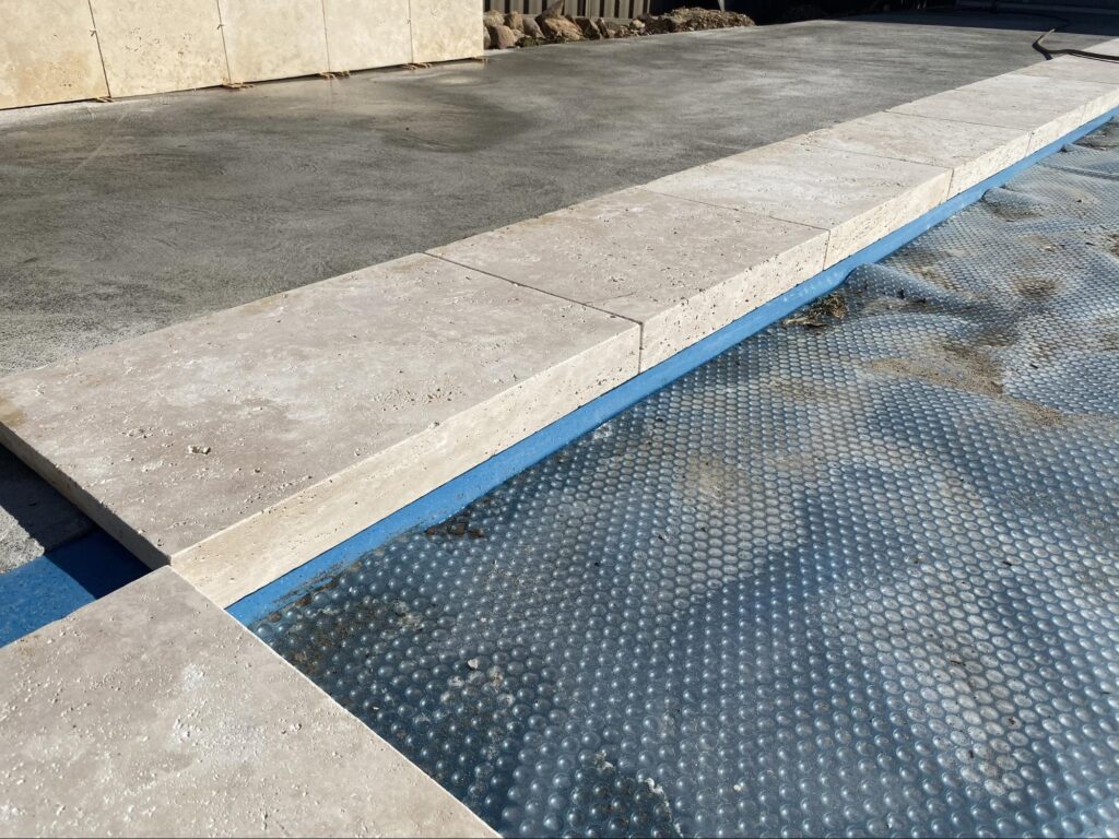 Stone pool area tiles
