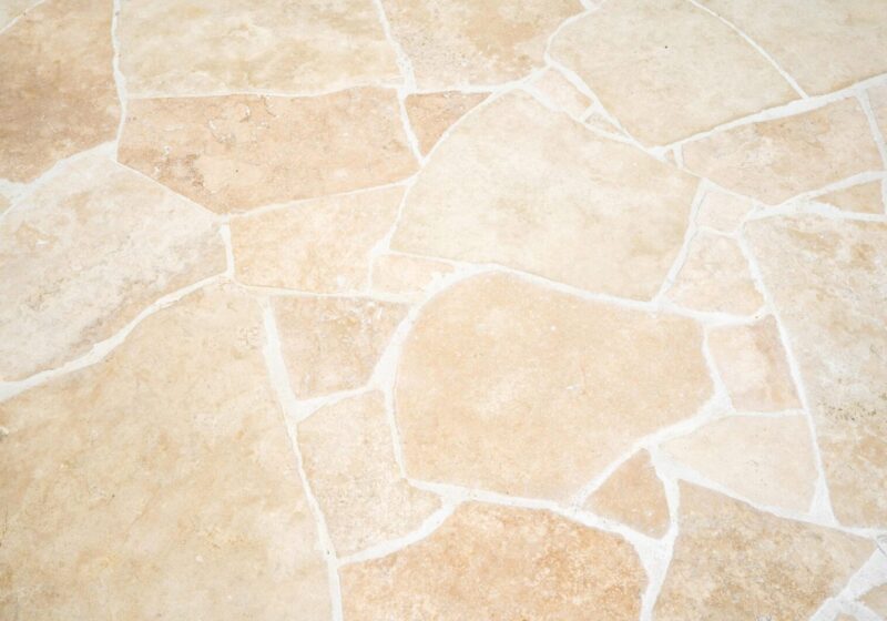 Natural stone crazy paving pool surround and outdoor area