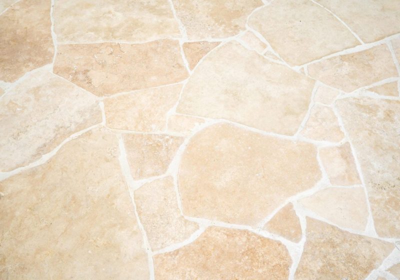 Natural stone crazy paving pool surround and outdoor area