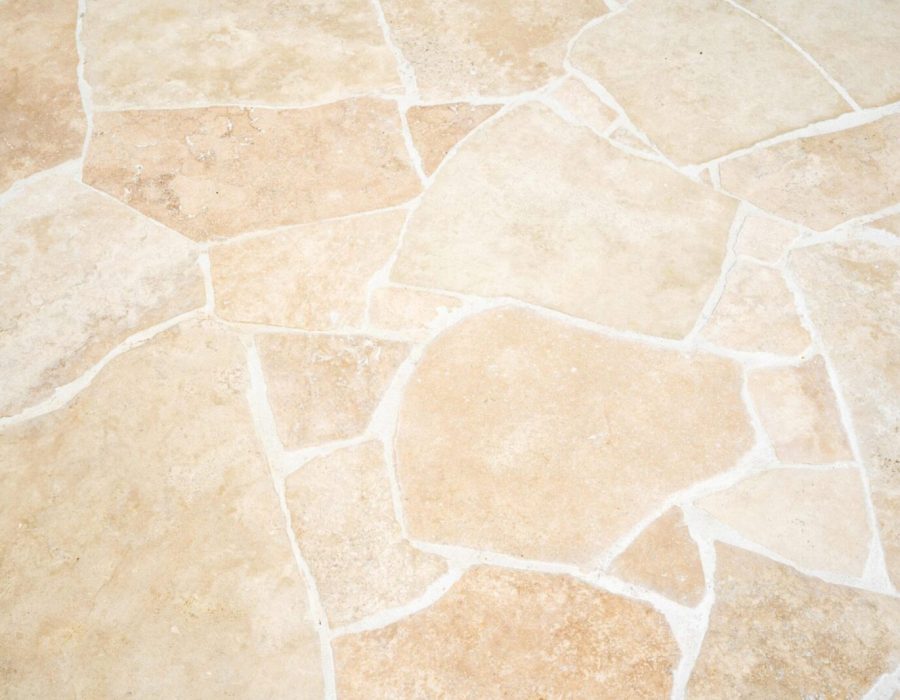 Natural stone crazy paving pool surround and outdoor area