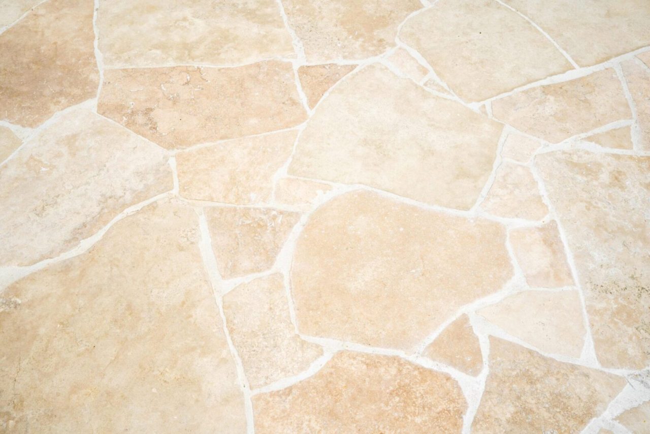Natural stone crazy paving pool surround and outdoor area