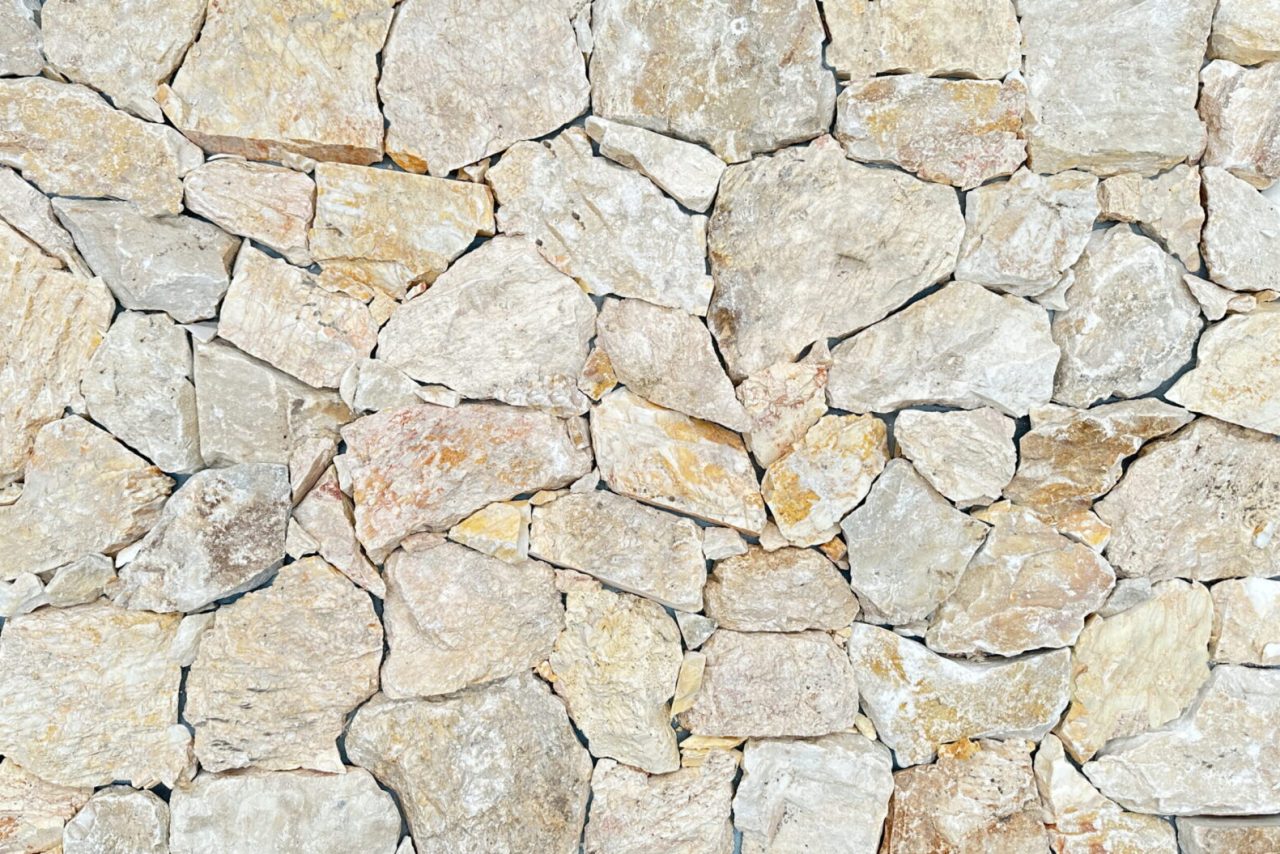 Coral natural stone wall cladding warm pink tone exterior walling
